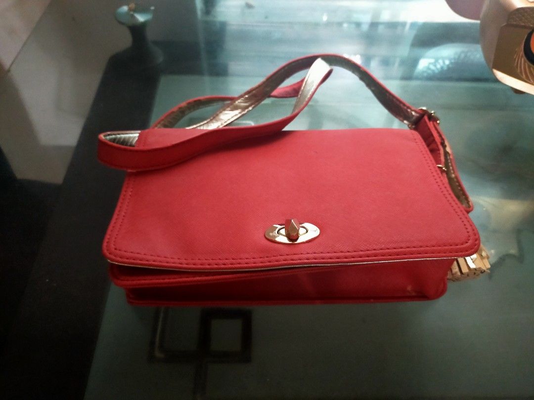 Red Body bag/ shoulder from japan (Category: Cross-body Bags) located in Quezon City. Submitted by jham.rose.2026 (Listing ID 1313128216, Image 1). Description: body/ shoulder bag.