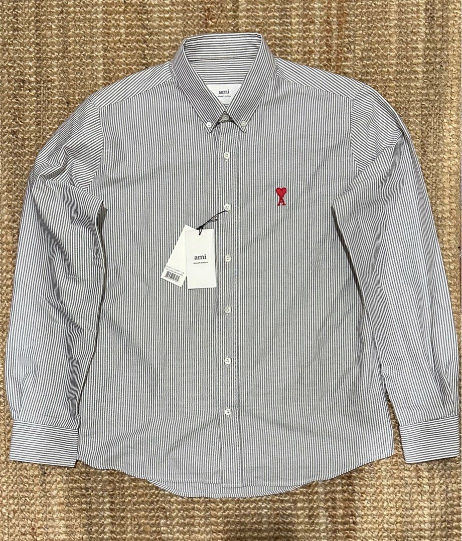 Ami Paris Alexandre Mattiussi Button-Down Shirt (Category: Formal Shirts) located in Makati City. Submitted by closetcleanout.manila (Listing ID 1313360394, Image 1). Description: 👔 Ami Paris Alexandre Mattiussi Button-Down Shirt 👔 🎨 White and Gray Stripes in 39 NOTE: No Issues. 🧾 PHP 20,000.00 ❌ No Return, No Exchange, and No Refund. .