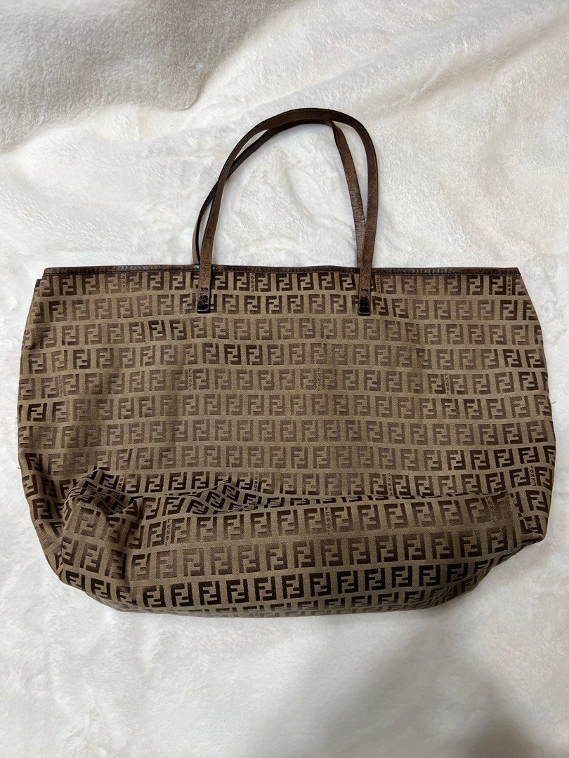 💯Authentic Fendi Zucchino Tote (Category: Luxury Bags & Wallets) located in Paranaque City. Submitted by authentic_mj (Listing ID 1313417332, Image 2). Description: 💯Authentic Fendi Zucchino Tote Preloved Authentic from Japan No inclusions Issue: leather dryness & corner rubs.