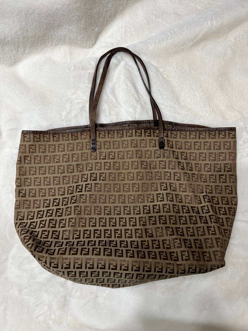 💯Authentic Fendi Zucchino Tote (Category: Luxury Bags & Wallets) located in Paranaque City. Submitted by authentic_mj (Listing ID 1313417332, Image 1). Description: 💯Authentic Fendi Zucchino Tote Preloved Authentic from Japan No inclusions Issue: leather dryness & corner rubs.
