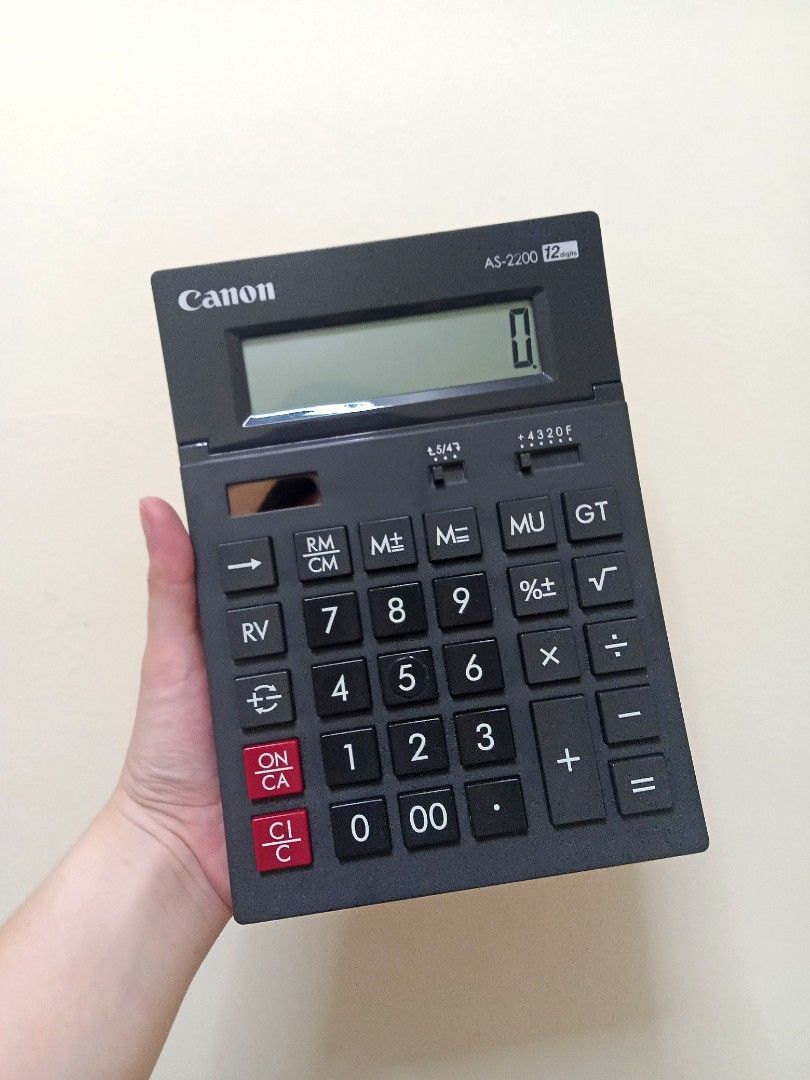 Basic Calculator - Canon AS 2200 (Category: Office & Business Technology) located in Silang. Submitted by thine0713 (Listing ID 1313261358, Image 1). Description: CANON AS-2200 Calculator Grand total function Mark up function Reverse function Large LCD display 2 key rollover Partly made with recycle product material Specifications: 12 digit Adjustable angle display Size: 198 x 140 x 34 mm Weight: 212 g Power source: Solar & Battery Rounding and d