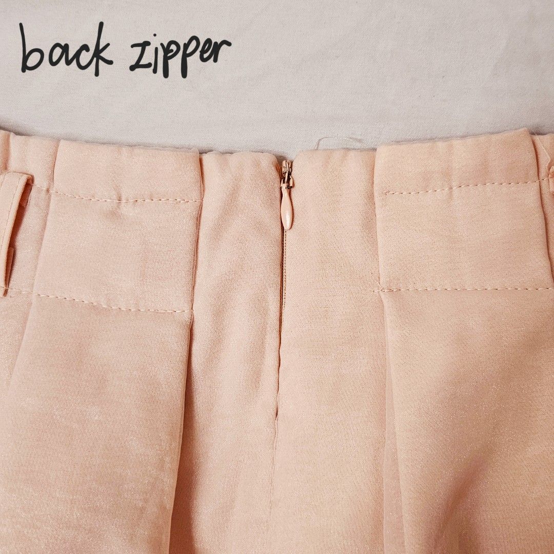 cute pink fluff skort (Category: Skirts) located in Manila. Submitted by loith (Listing ID 1313364505, Image 3). Description: cute pink fluff skort best fits 28-29" waistline; high waist rfs: does not fit me anymore ☹️ strengths: - used 2-3x - color is still 10/10 - zipper still functions well - fabric is thick - it's a skort, so the inner lining are shorts so it's very comfortable to wear - looks very pretty and preppy in person! - see when worn
