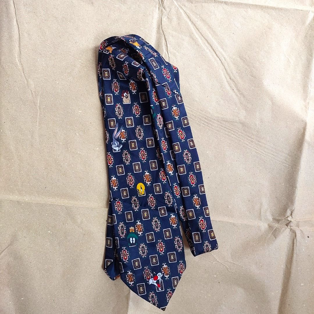 Dark blue looney tunes necktie (Category: Ties) located in Quezon City. Submitted by purplemich (Listing ID 1313232805, Image 1). Description: Decluttering super sale Payment through GCash and BPI. Message me for details..