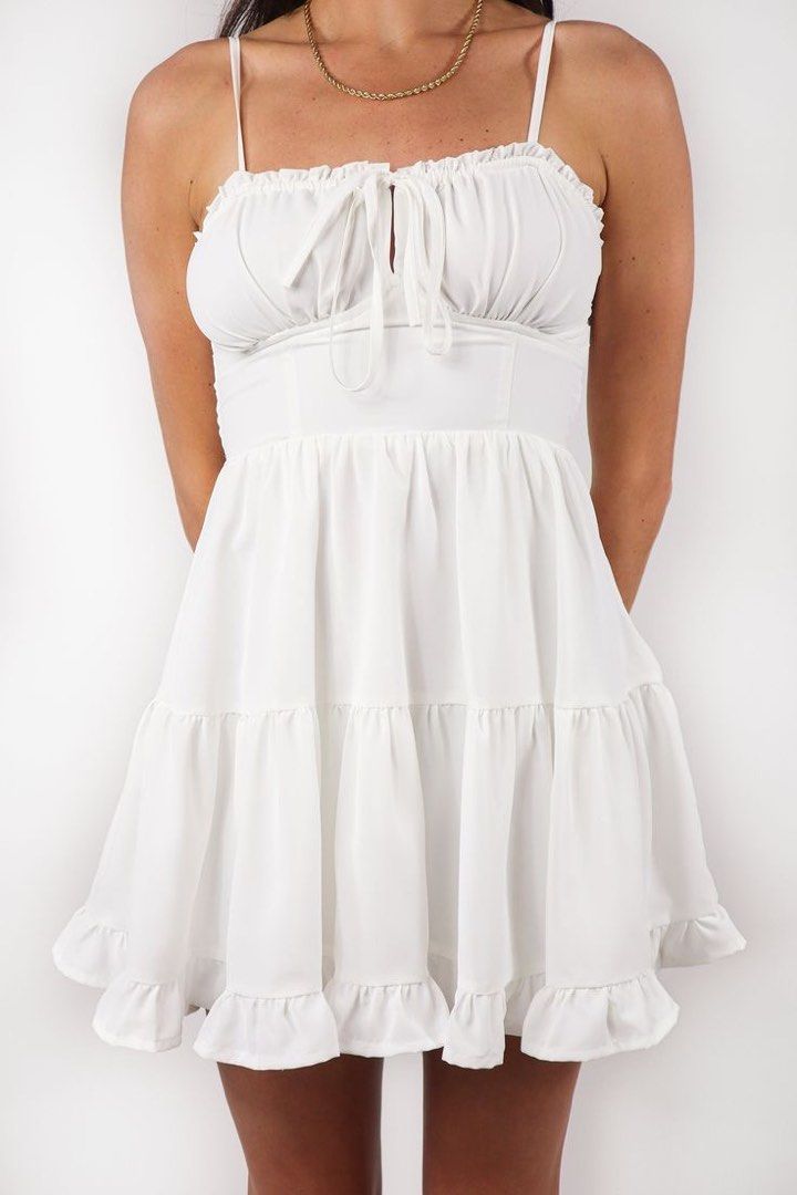 Grey Bandit Ravello dress (Category: Dresses) located in Baguio. Submitted by beniceeee_ (Listing ID 1313372769, Image 1). Description: Grey Bandit Ravello Dress White summer dress Large on tag but fit small-large since it has garter Retails for about 5k.
