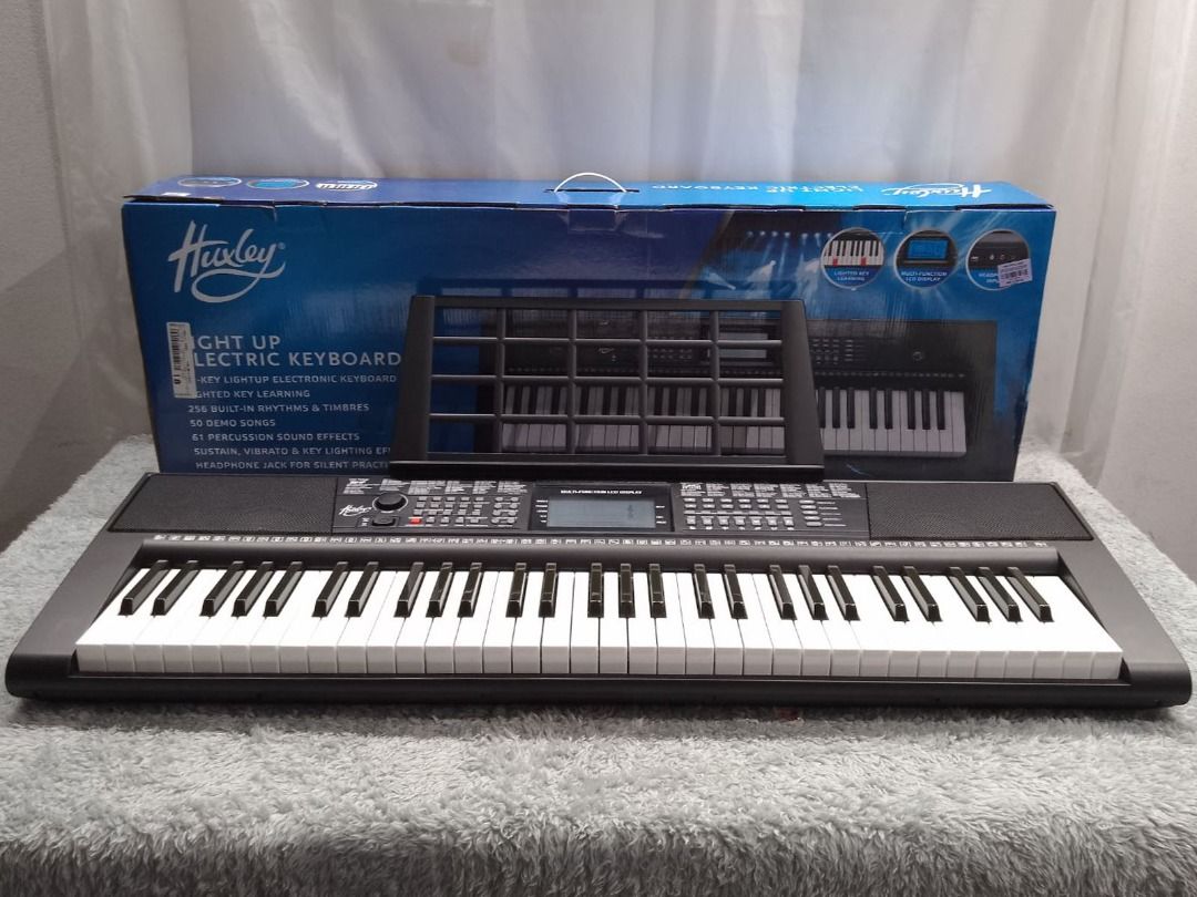 Huxley Light Up Electric Keyboard 61 Key ALUKB0124, Hobbies & Toys