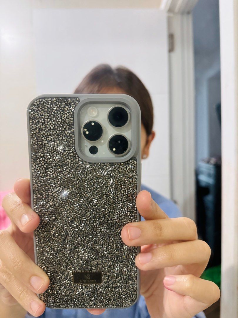 Iphone 15 Pro Max cases (Category: Cases & Sleeves) located in Mandaluyong City. Submitted by jdlreal (Listing ID 1313284632, Image 2). Description: Swar***ski inspired cases for 15 Pro Max P600 for both 🩷 Used for a few hours only. See last 2 photos for reference when fitted on phone. *case does not include the Sonny Angel hipper. .