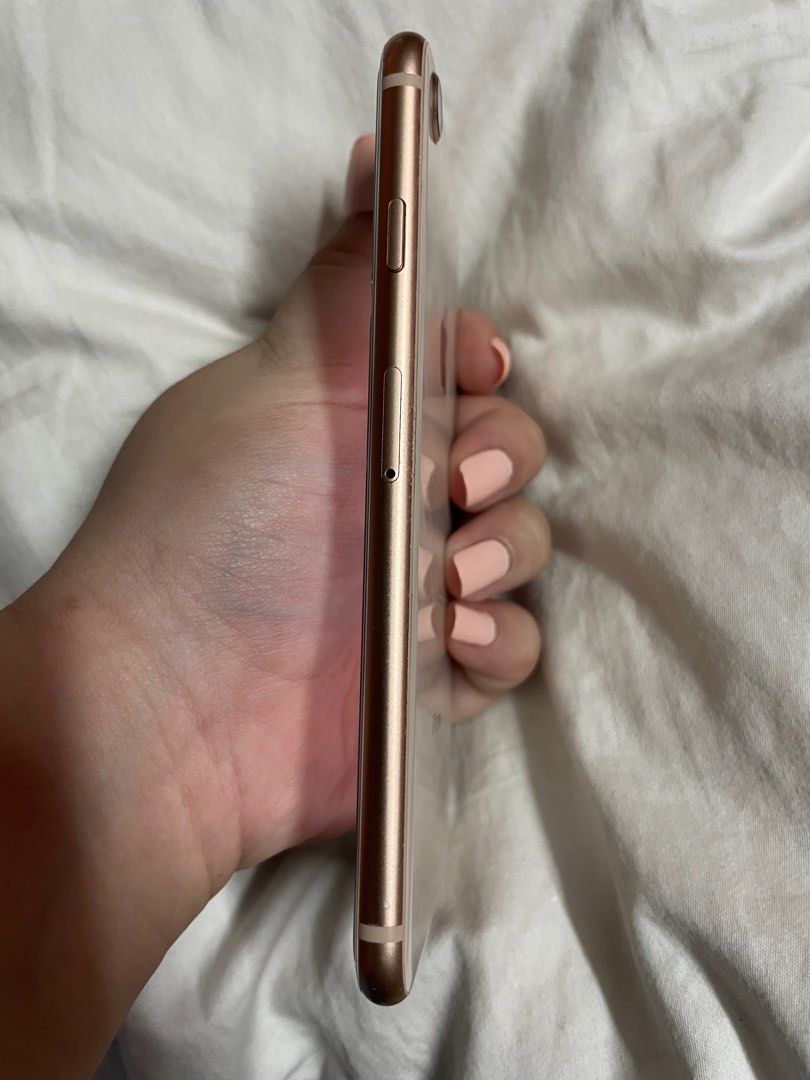 iPhone 8 64GB Gold (Category: iPhone 8 Series) located in Manila. Submitted by tyreseig (Listing ID 1313336554, Image 3). Description: price is slightly negotiable Condition: well-used; no issues; minimal scratches and dents (see photos) Storage: 64GB Color: Gold Battery Health: 76% RFS: Phone Upgrade Cracks are only on the tempered glass ✅ Updated to IOS 16.7.8 ✅ Fingerprint and Home Button working ✅ Front and back cameras are working.