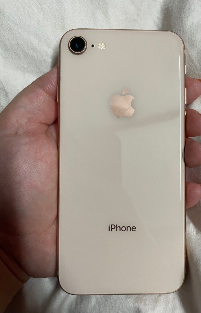 iPhone 8 64GB Gold (Category: iPhone 8 Series) located in Manila. Submitted by tyreseig (Listing ID 1313336554, Image 1). Description: price is slightly negotiable Condition: well-used; no issues; minimal scratches and dents (see photos) Storage: 64GB Color: Gold Battery Health: 76% RFS: Phone Upgrade Cracks are only on the tempered glass ✅ Updated to IOS 16.7.8 ✅ Fingerprint and Home Button working ✅ Front and back cameras are working.