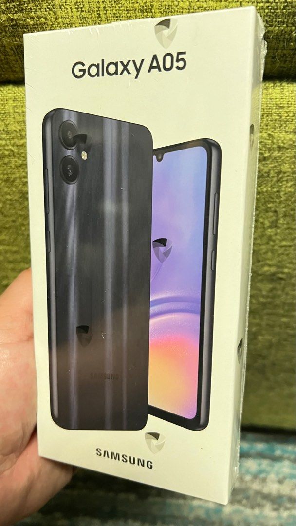 SAMSUNG A05 (Category: Samsung) located in Quezon City. Submitted by jake_labro (Listing ID 1313390224, Image 3). Description: BNEW. Sealed. CHEAPEST in the market Slightly Negotiable. RFS. Extra phone. Issued by smart. 1st sim slot Smart locked. 2nd sim slot open line. RAM 6GB | ROM 64GB Meet up: SM Novaliches or SM North.