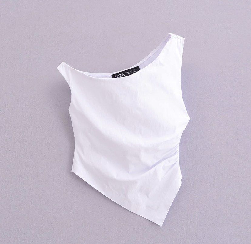 White One Shoulder Top [BRAND NEW] (Category: Sleeveless) located in Manila. Submitted by cinnamaldehyde (Listing ID 1313266846, Image 1). Description: -Brand New, Never Used -Zara dupe -RFS: Small doesn’t fit me.
