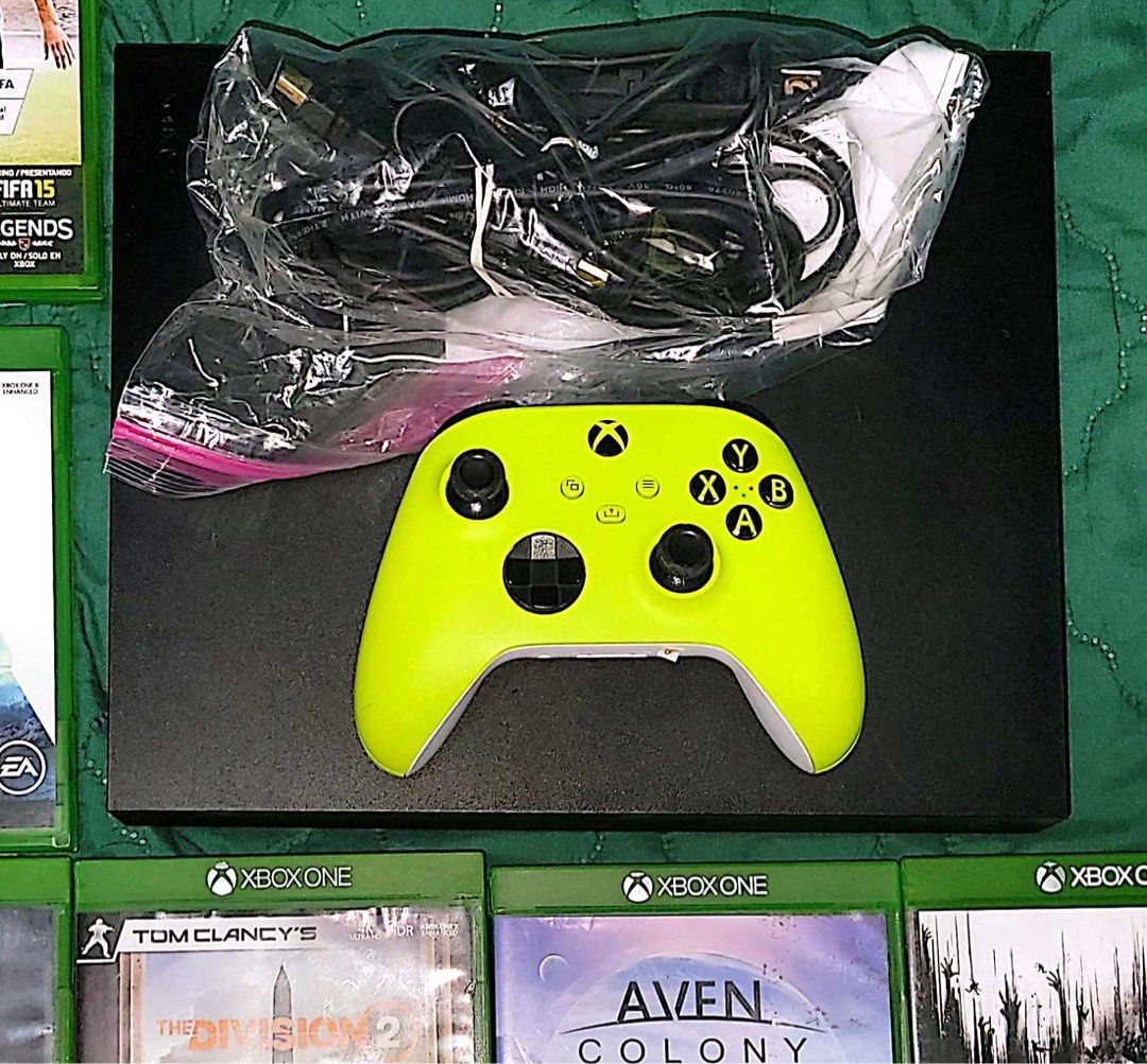 XBOX ONE X 1TB with (2) Wireless controllers and 6 games (Category: Xbox) located in Pasig City. Submitted by gracegorgeous (Listing ID 1313264294, Image 1). Description: XBOX ONE X 1TB with (2) Wireless controllers includes XBOX One games. 10,000k PHP GCash accepted (2) Wireless Controller with charge cords, and 2 Batteries. - HDMI and console power cord. Original XBOX console box Not included. Includes: (5) XBOX ONE Games original covers and al