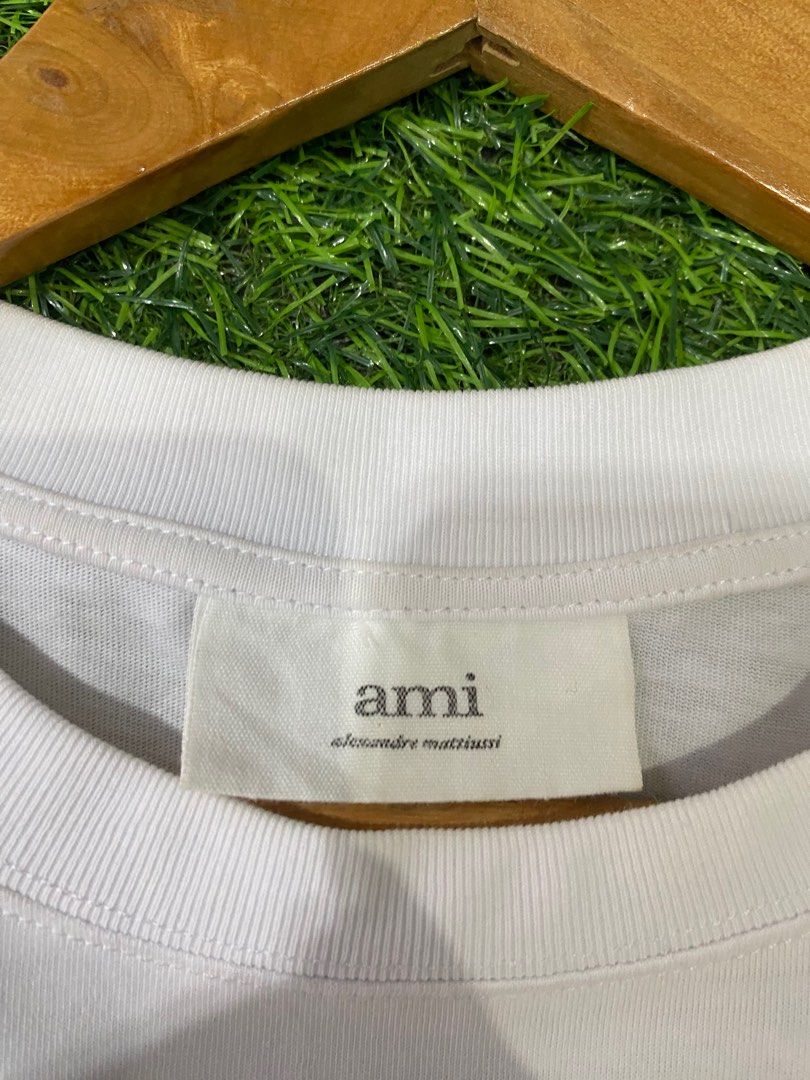 AUTHENTIC AMI SHIRT (Category: Tshirts & Polo Shirts ) located in Pinamalayan. Submitted by initialthriftstore (Listing ID 1317640208, Image 2). Description: FOR SALE‼️ Ami big logo Shirt VERY GOOD Condii Dimes: 25x23 Boxy type ✅ Color Rate: 9.5/10 ✅ Issues: None ❌ Pm lang po sa may gusto mga boss 😇.