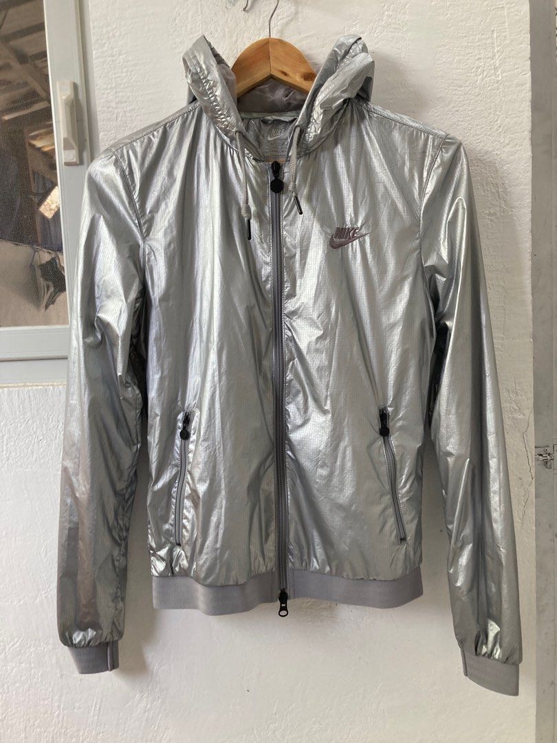 Authentic Nike Sportswear Metallic Silver Zip Up Hooded Windbreaker Jacket for Women s Size S on tag dimes is 18 X 23.4 Women s Fashion Coats Jackets and Outerwear on Carousell