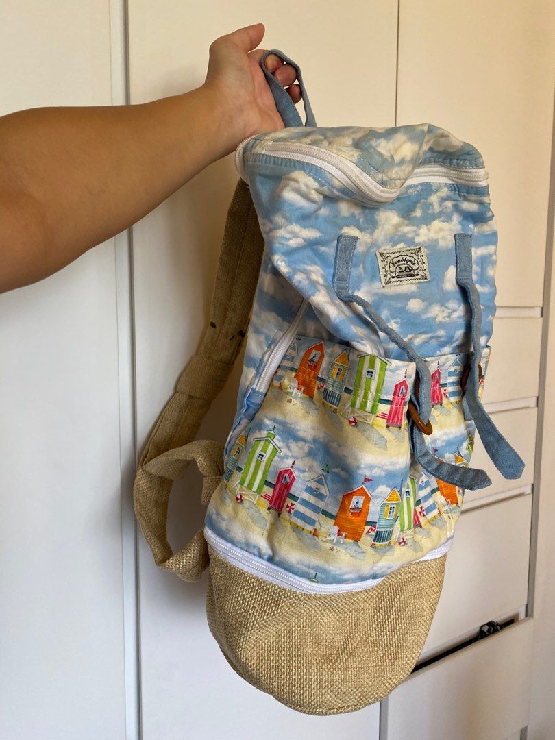 Beachhouse Print Backpack (Category: Backpacks) located in Singapore. Submitted by anngry (Listing ID 1317618449, Image 1). Description: Cylindrical backpack by a small business featuring a cute and bright print of beachhouses.