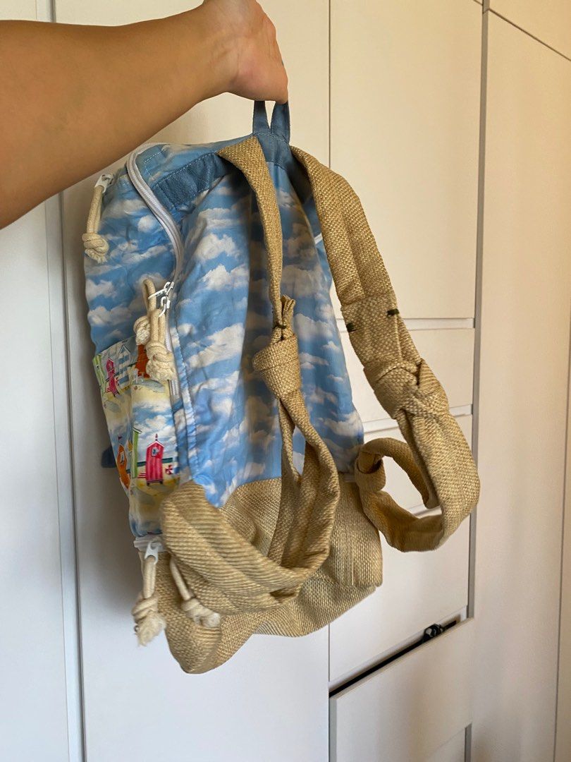 Beachhouse Print Backpack (Category: Backpacks) located in Singapore. Submitted by anngry (Listing ID 1317618449, Image 2). Description: Cylindrical backpack by a small business featuring a cute and bright print of beachhouses.