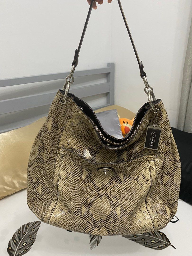 Coach Park Python Hobo (Category: Luxury Bags & Wallets) located in Manila. Submitted by nienieniee (Listing ID 1317678165, Image 3). Description: - used but does not look worn out at all - snake design is still very prominent and no major flaw - rfs: too many bags - decluttering .