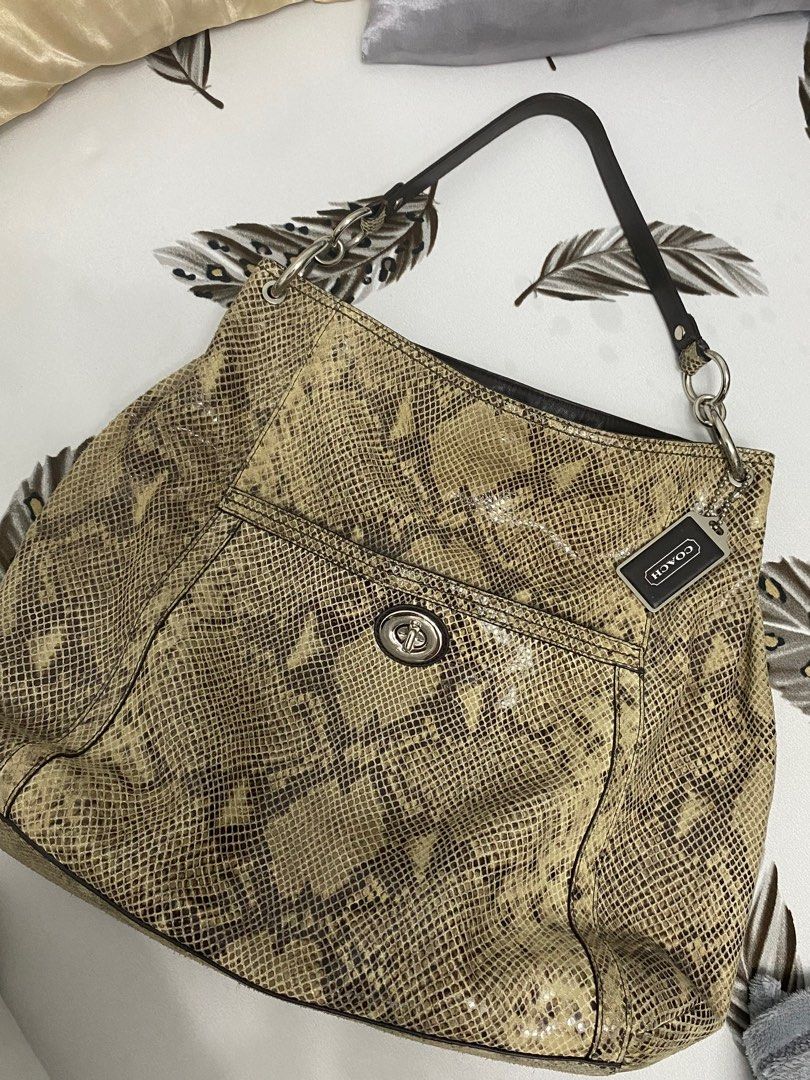Coach Park Python Hobo (Category: Luxury Bags & Wallets) located in Manila. Submitted by nienieniee (Listing ID 1317678165, Image 1). Description: - used but does not look worn out at all - snake design is still very prominent and no major flaw - rfs: too many bags - decluttering .