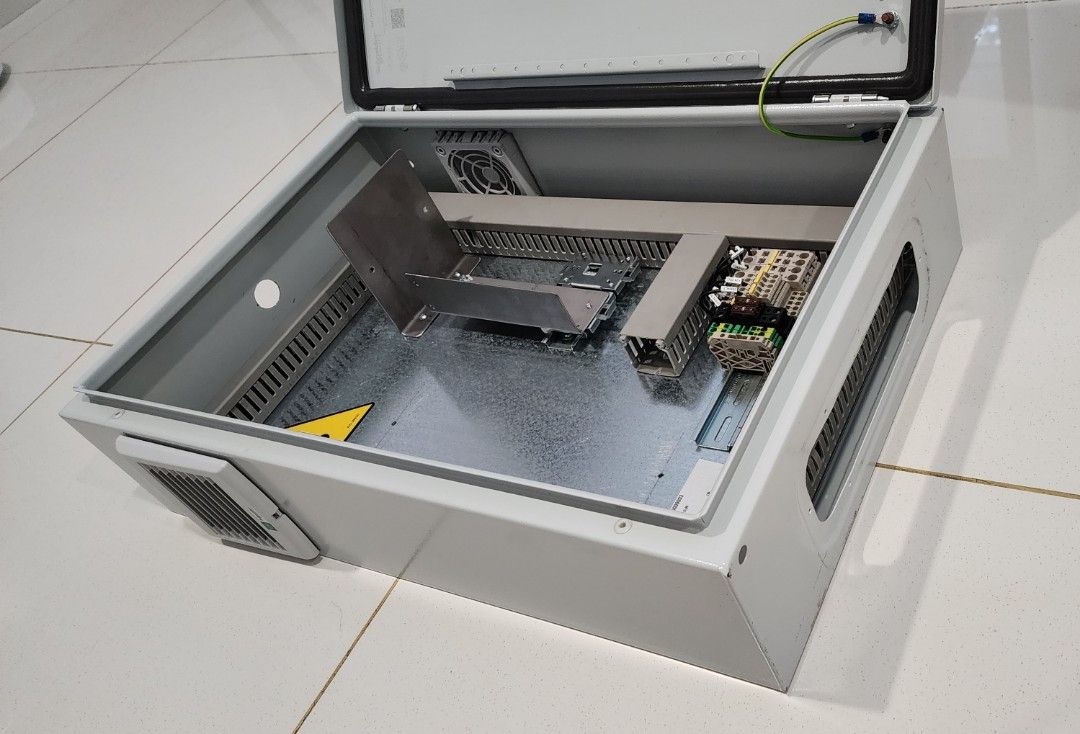 Electrical Panel (Category: Other Accessories) located in Singapore. Submitted by cychan1969 (Listing ID 1317577938, Image 3). Description: one electrical panel box with cable access and grounded weather seal door. Dimension and condition as shown in picture. some cable truck, terminal blocks and rail can be seem. Price negotiable..