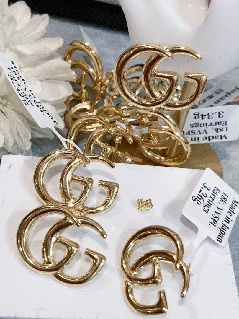 Gucci earrings snake top