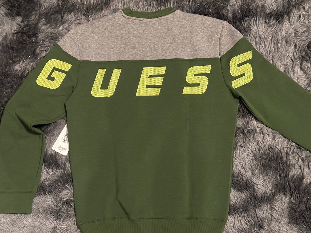 Guess Scuba Back Logo Sweatshirt (Category: Coats, Jackets and Outerwear) located in Manila. Submitted by declutter_270 (Listing ID 1317677349, Image 3). Description: -never been worn -comes with tag -rfs decluttering *Cotton Blend Sweatshirt *Crew Neck *Long Sleeves *Regular Fit Fabric Type: Scuba Fabric Detail: Color Block Embellishments: Back Logo.