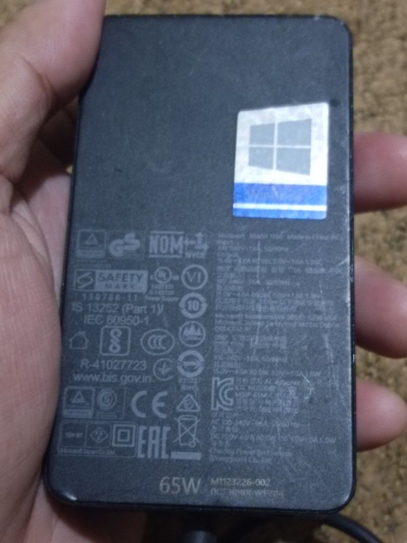 Microsoft surface 65W base head adapter (Category: Cables & Adaptors) located in Quezon City. Submitted by markgolveo (Listing ID 1317680589, Image 3). Description: Microsoft surface 65W base head adapter base unit adapter only cable attachment missing not included.