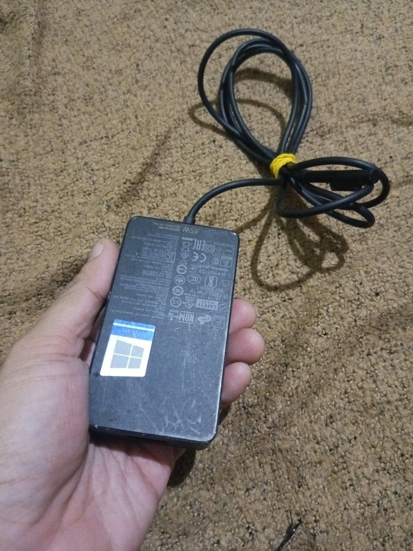 Microsoft surface 65W base head adapter (Category: Cables & Adaptors) located in Quezon City. Submitted by markgolveo (Listing ID 1317680589, Image 1). Description: Microsoft surface 65W base head adapter base unit adapter only cable attachment missing not included.