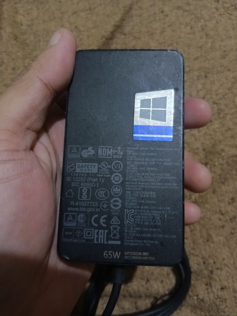 Microsoft surface 65W base head adapter (Category: Cables & Adaptors) located in Quezon City. Submitted by markgolveo (Listing ID 1317680589, Image 2). Description: Microsoft surface 65W base head adapter base unit adapter only cable attachment missing not included.