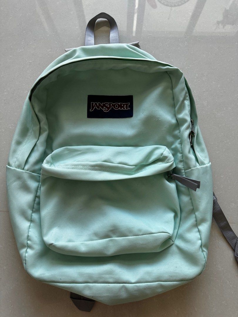 Mint green jansport schoolbag