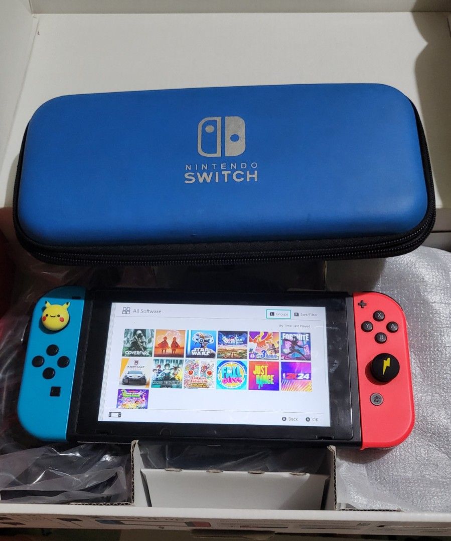 Nintendo Switch V2 Complete Inclusions with Games (Category: Nintendo) located in Bocaue. Submitted by ekaaam (Listing ID 1317608066, Image 1). Description: ❗️❗️❗️7,500❗️❗️❗️ Issue is already in the photo po. Di naman po sya nakaapekto sa performance. Nagkaron ng lines while playing Monster Hunter recently lang po, di naman sya nabagsak:( Also, medyo pudpod na rin po ung left analog, bought new thumb grips po. Selling this for 7,500php Games incl