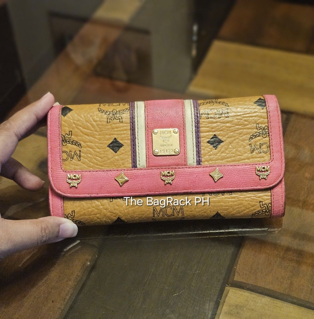 Original MCM Cognac Wallet (Category: Luxury Bags & Wallets) located in Cabanatuan. Submitted by meyrasol (Listing ID 1317673386, Image 1). Description: corner wears oxidized edges penmarks signs of dirt.
