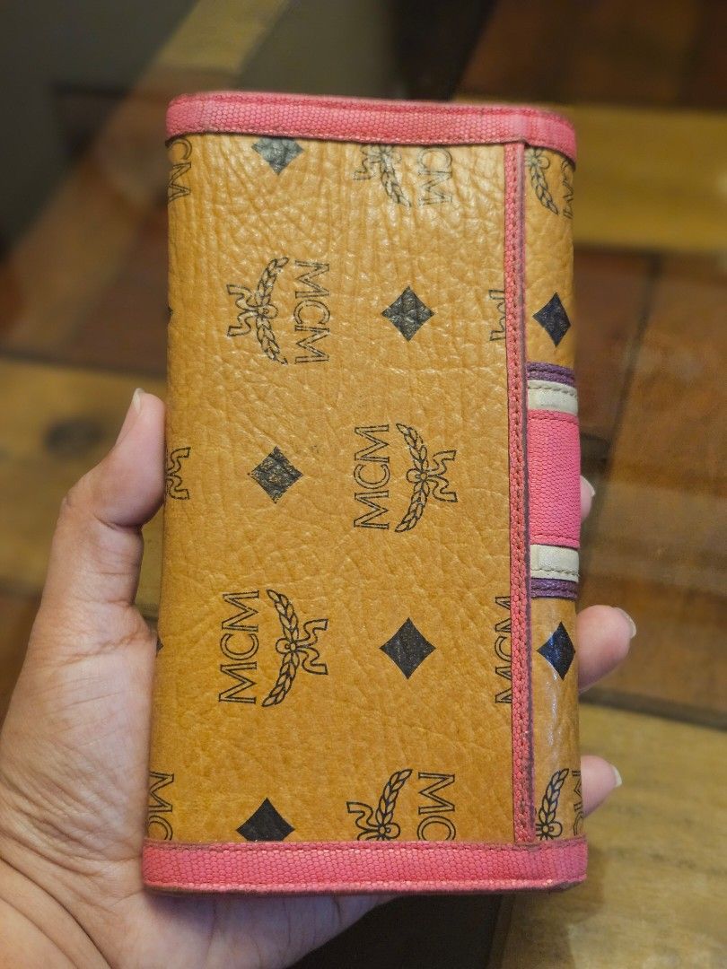 Original MCM Cognac Wallet (Category: Luxury Bags & Wallets) located in Cabanatuan. Submitted by meyrasol (Listing ID 1317673386, Image 2). Description: corner wears oxidized edges penmarks signs of dirt.