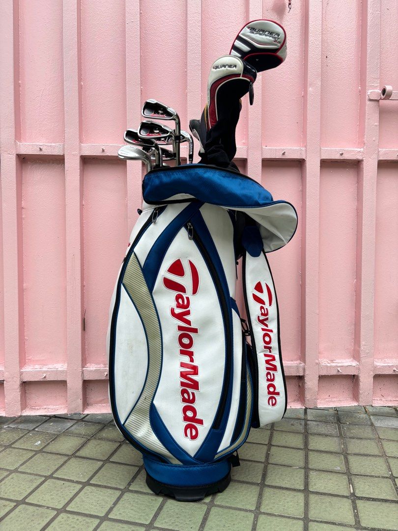 Taylormade Burner Plus Golf Set with Taylormade Bag (Category: Golf) located in Manila. Submitted by eclipse58 (Listing ID 1317624526, Image 1). Description: COMPLETE 2009 Taylormade Burner Plus Golf Set ✅️ 5-9 Irons, Pitching Wedge, Approach Wedge & Bridgestone 52 degree & 56 degree Wedge ✅️ Taylormade Burner Superfast 2.0 Driver, Taylormade Rescue Fairway 3 Wood & 5 Wood & Taylormade Burner 5 Wood ✅️ Odyssey White Hot Putter & Taylormade Golf B
