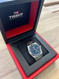 BNIB Tissot PRX Powermatic 80 (Category: Watches) located in Singapore. Submitted by jxjd091737 (Listing ID 1317699010, Image 3). Description: Selling Brand New In Box TISSOT PRX Powermatic 80 (Blue) in 35mm. Not worn, plastic protective film still in place, comes with warranty and box. Selling as 35mm too small for me. RTP: $1000.
