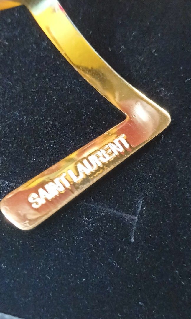 YSL bangle from japan (Category: Luxury Accessories) located in Quezon City. Submitted by liambags (Listing ID 1317543020, Image 2). Description: YSL bangle from japan no flaws with stamp with box,dustbag and paper bag size 18 kindly pm me.