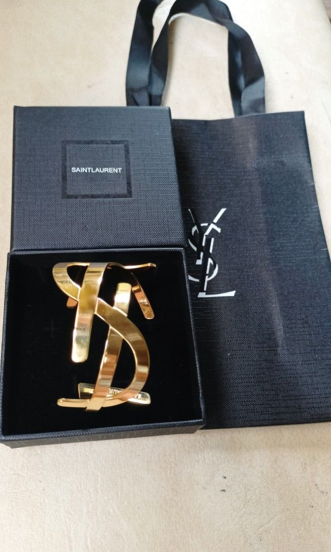 YSL bangle from japan (Category: Luxury Accessories) located in Quezon City. Submitted by liambags (Listing ID 1317543020, Image 3). Description: YSL bangle from japan no flaws with stamp with box,dustbag and paper bag size 18 kindly pm me.