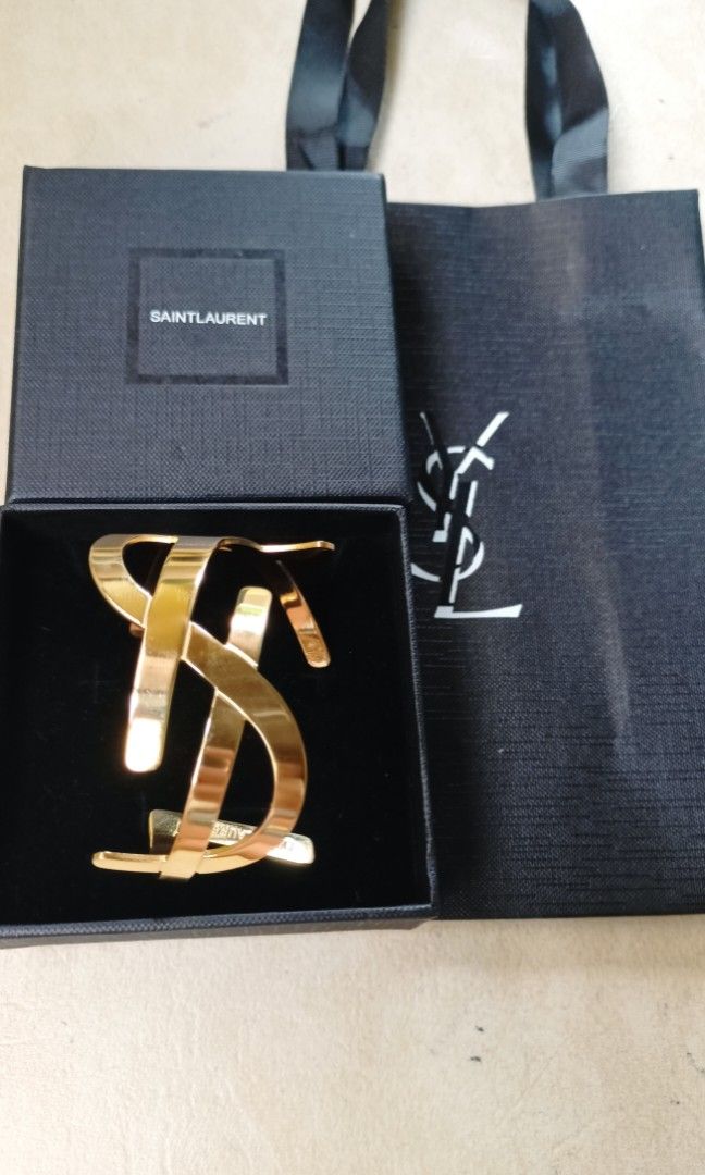 YSL bangle from japan (Category: Luxury Accessories) located in Quezon City. Submitted by liambags (Listing ID 1317543020, Image 1). Description: YSL bangle from japan no flaws with stamp with box,dustbag and paper bag size 18 kindly pm me.