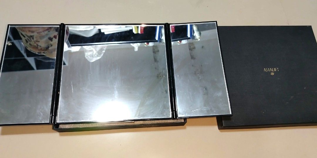 Astalift Trifold Make up Mirror (Category: Mirrors) located in Polomolok. Submitted by dkljapansurplus (Listing ID 1319276623, Image 3). Description: Astalift trifold mirror from japan Issue: sa brown na part natangal ang lining All goods condition na Freeshipping.