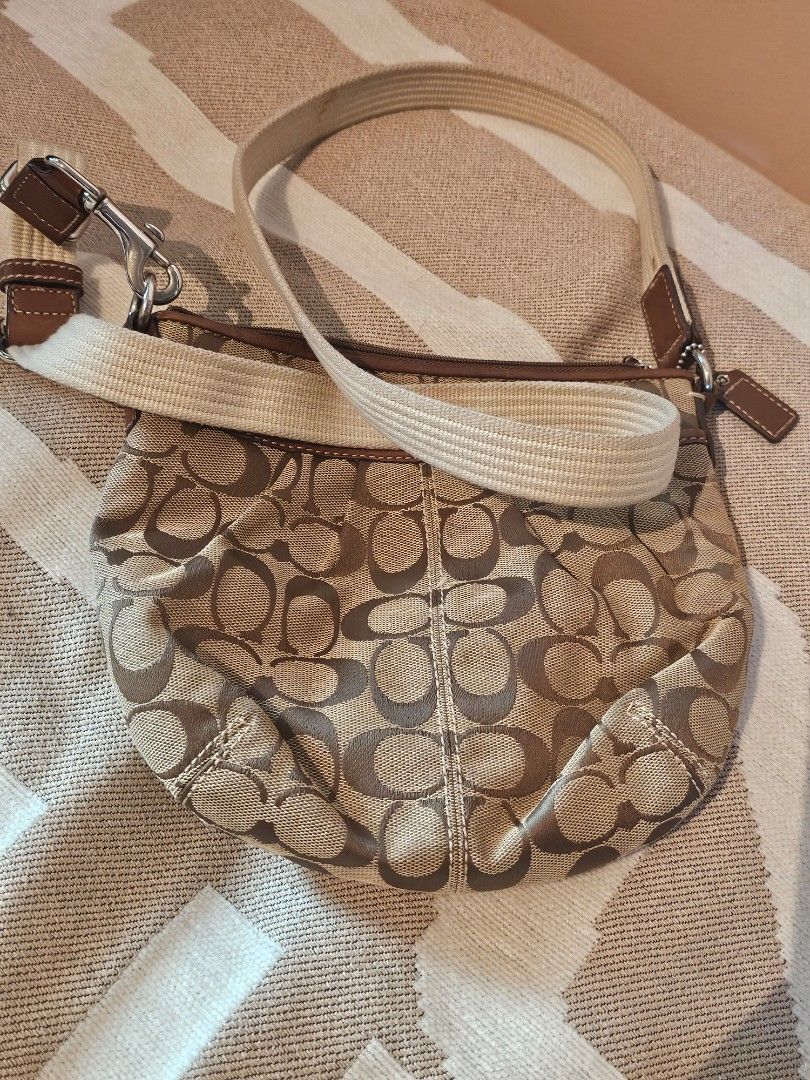 FAST BREAK SALE Authentic Coach Sling Bag (Category: Cross-body Bags) located in Makati City. Submitted by lhuper (Listing ID 1319150007, Image 1). Description: ➡️ Authentic ➡️ Preloved ➡️ Used but not abused ➡️ RFS: Decluttering DISCLAIMER: YOU ARE BUYING PRELOVED ITEM, ANTICIPATE THE CONDITION OF THE BAG. BUY A BRAND NEW IF YOU WANT A BRAND NEW CONDITION..