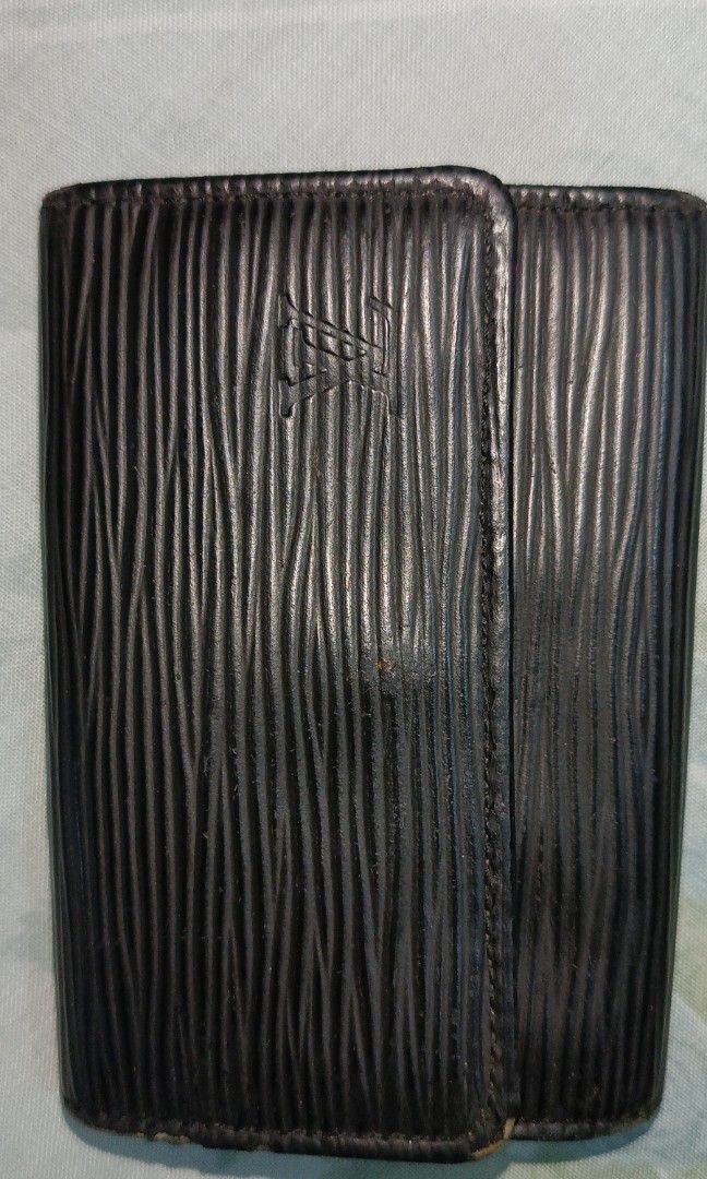 Sale!!! Authentic Louis Vuitton Epi 6 Key Case (Category: Luxury Bags & Wallets) located in Romblon. Submitted by migustyles (Listing ID 1319290199, Image 1). Description: Authentic Louis Vuitton Epi 6 Key Case in good condition coded with authors initial.