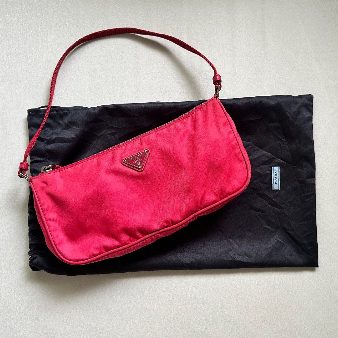 Authentic PRADA Hot Pink Pochette (Category: Luxury Bags & Wallets) located in Manila. Submitted by serendipitymanila (Listing ID 1319213814, Image 1). Description: .