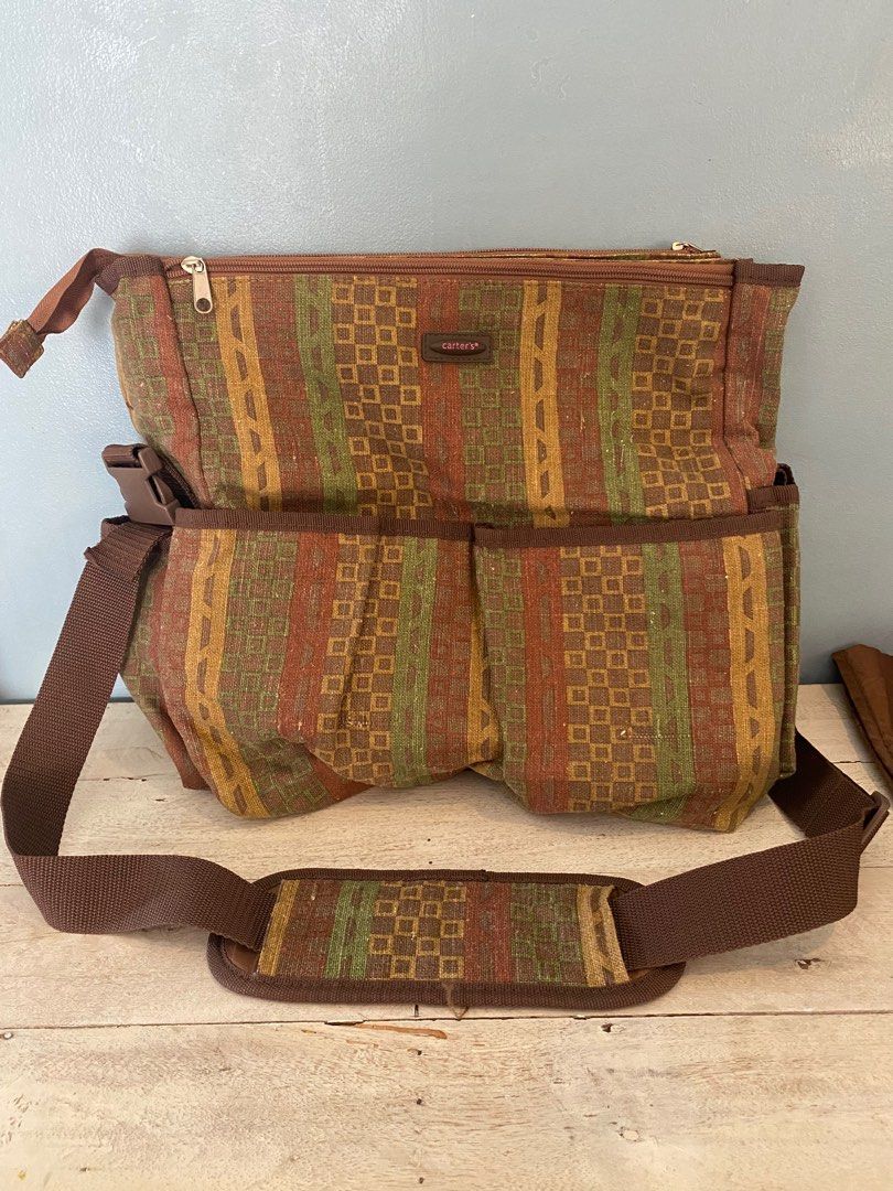 Carter’s Diaper Bag (Category: Tote Bags) located in Cavite. Submitted by astjo (Listing ID 1319171375, Image 1). Description: very good condition super daming pockets to organize your baby stuff GCASH Bacoor Area.