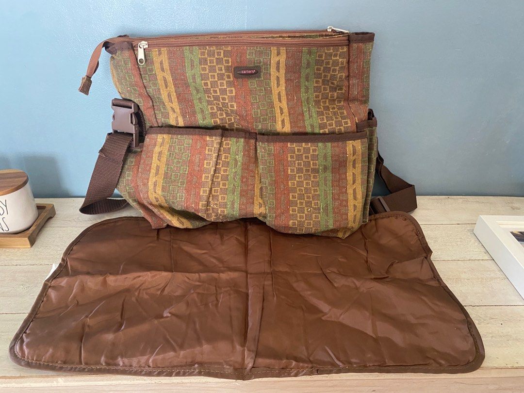 Carter’s Diaper Bag (Category: Tote Bags) located in Cavite. Submitted by astjo (Listing ID 1319171375, Image 3). Description: very good condition super daming pockets to organize your baby stuff GCASH Bacoor Area.