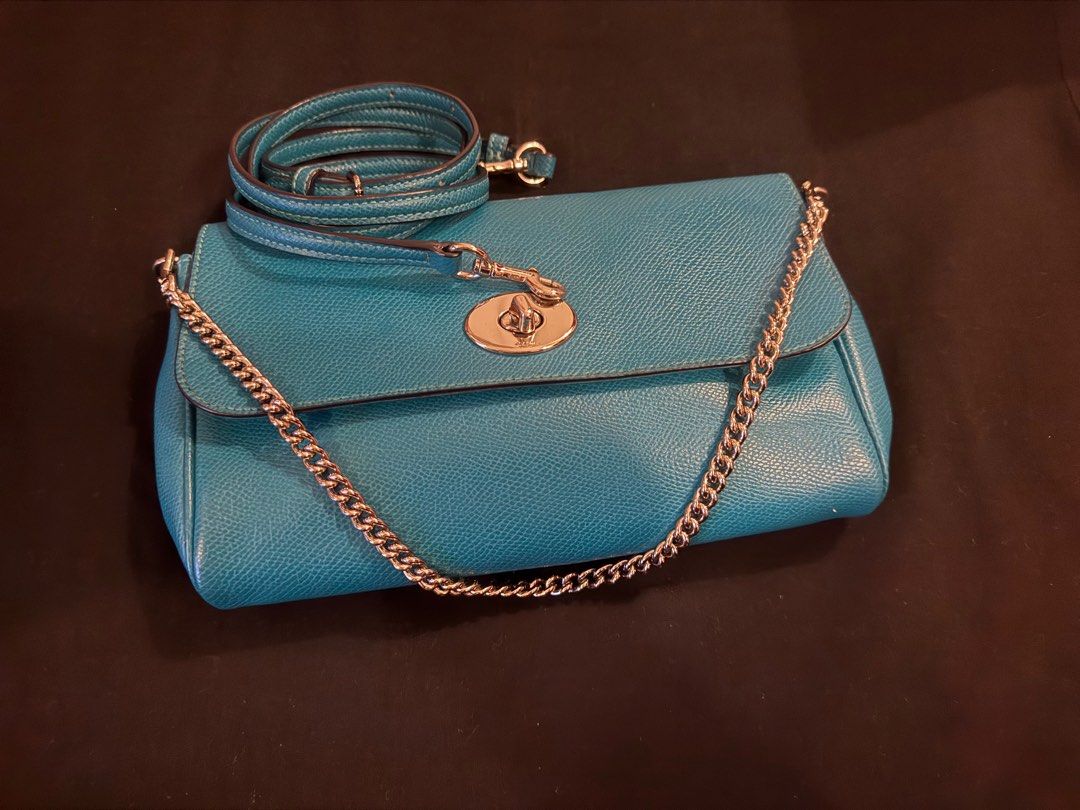 Coach Ruby cross body or kili kili bag (Category: Luxury Bags & Wallets) located in Del Monte. Submitted by sahsha1023 (Listing ID 1319318968, Image 3). Description: AUTHENTIC Coach cross body with metal chain. Can be used as kili kili bag. RFS: no longer using .