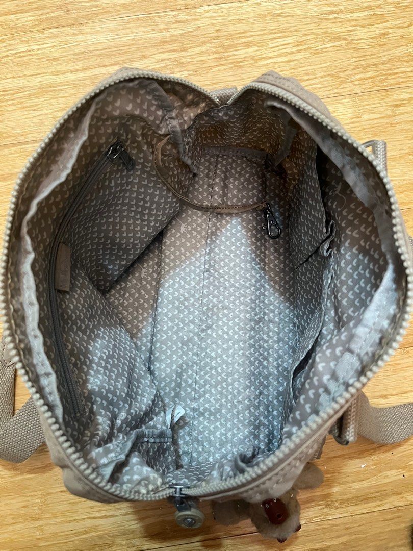 Kipling Beige Shoulder Cross Body Sling Bag (Category: Shoulder Bags) located in Quezon City. Submitted by hazpreloved (Listing ID 1319192444, Image 3). Description: Original price is 3K+ Bought this in the US, well used Quality is still great, as most kipling bags There’s slight peeling on the leather parts but barely noticeable from afar Comes with a longer strap RFS: decluttering tags: kipling longchamp coach guess kate spade backpack shoulder