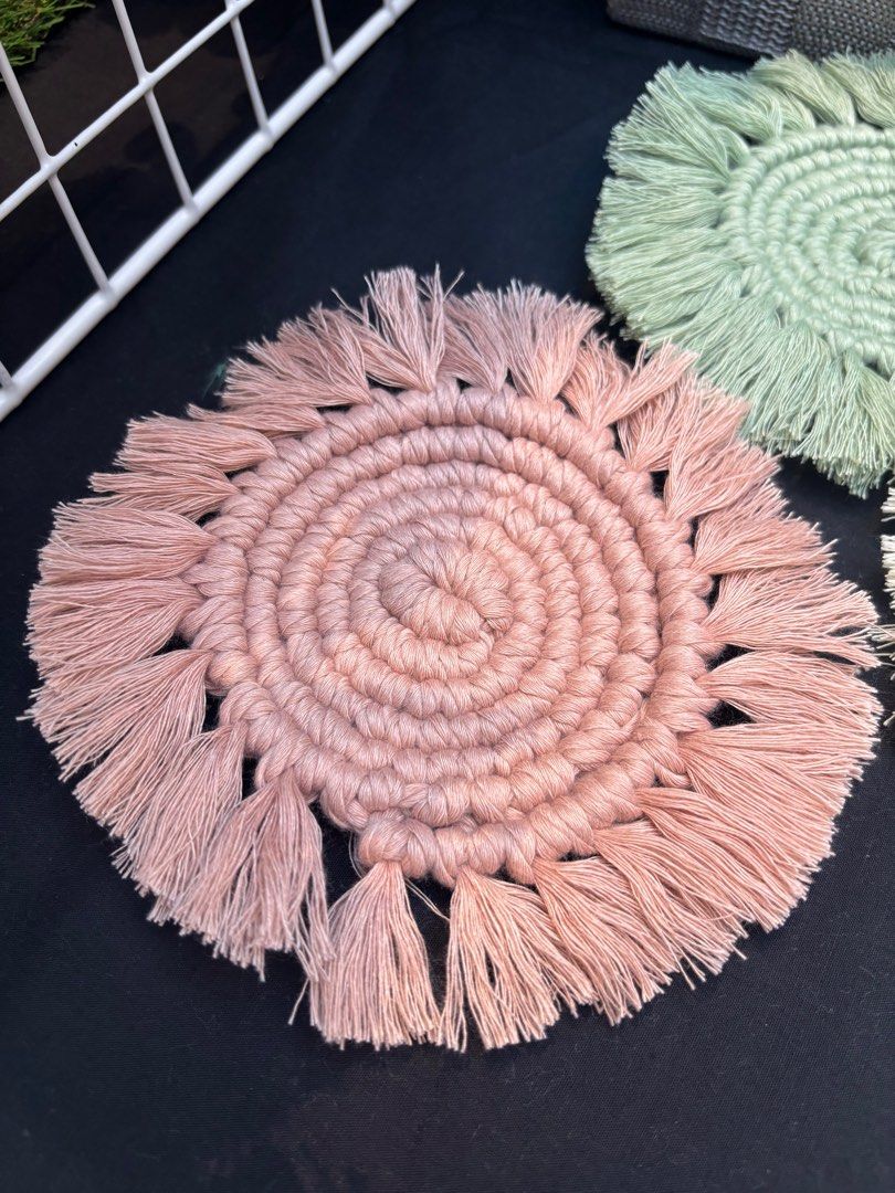Macrame coaster set (Category: Handmade Craft) located in Singapore. Submitted by fionnchua (Listing ID 1319215421, Image 3). Description: Handmade from scratch - macrame rope Green pink and yellow Selling 1 set of 3 - total $12 Large enough to put a big cup/mug or even a small bowl About 8cm the flat portion (not counting the fluffy edges) - individual differences apply as all handmade Meet up simei weekdays or boonlay weekends or mail - to top 