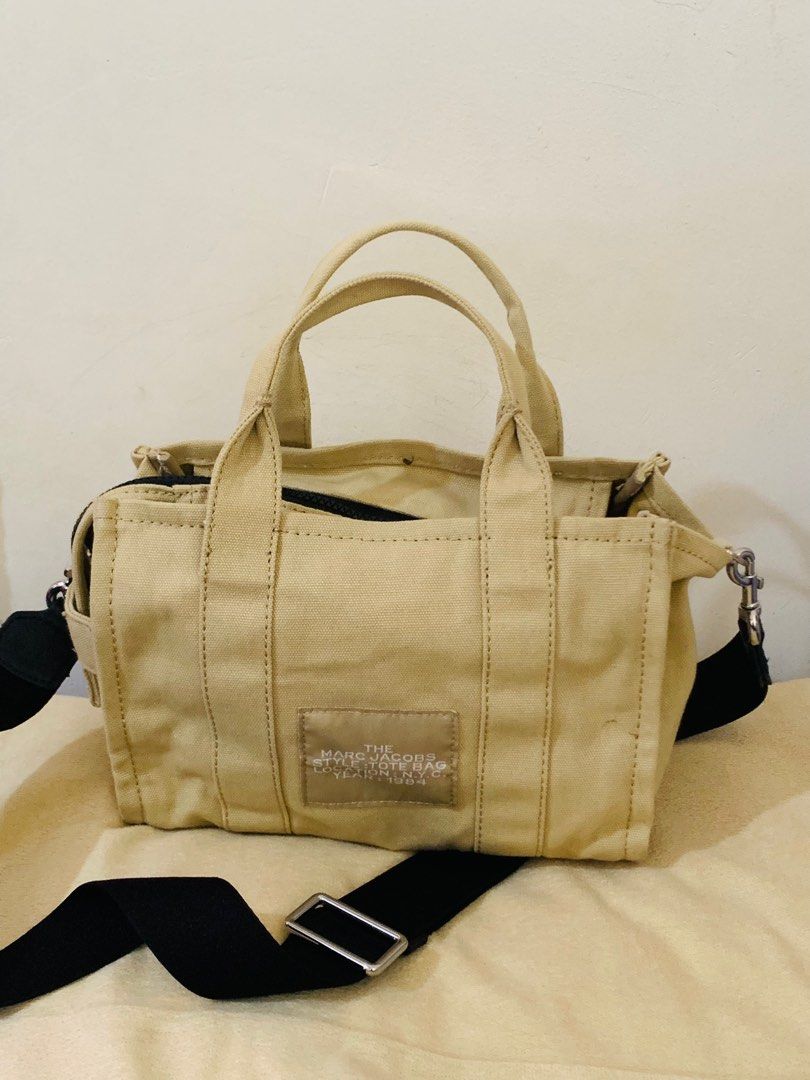 MARC JACOBS THE TOTE BAG (Category: Luxury Bags & Wallets) located in Zamboanga. Submitted by elfinds0.2 (Listing ID 1319180649, Image 2). Description: Title: MARC JACOBS THE TOTE BAG Description: PRELOVED MARC JACOBS THE TOTE BAG. IN NUDE COLOR. SMALL SIZE. UKAY SOURCED Price: Php5500 Flaws: Needs wash since ukay Mode of Payment: GCASH Delivery Options: LBC AND JRS.