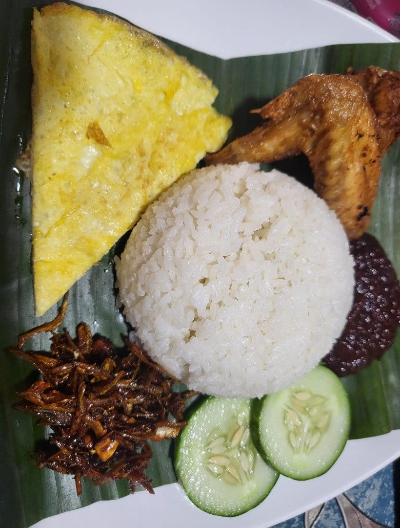 Nasi Lemak Kukus (Category: Local Eats) located in Singapore. Submitted by rarefox.303cf8 (Listing ID 1319246036, Image 2). Description: min 20 packs delivery $20.