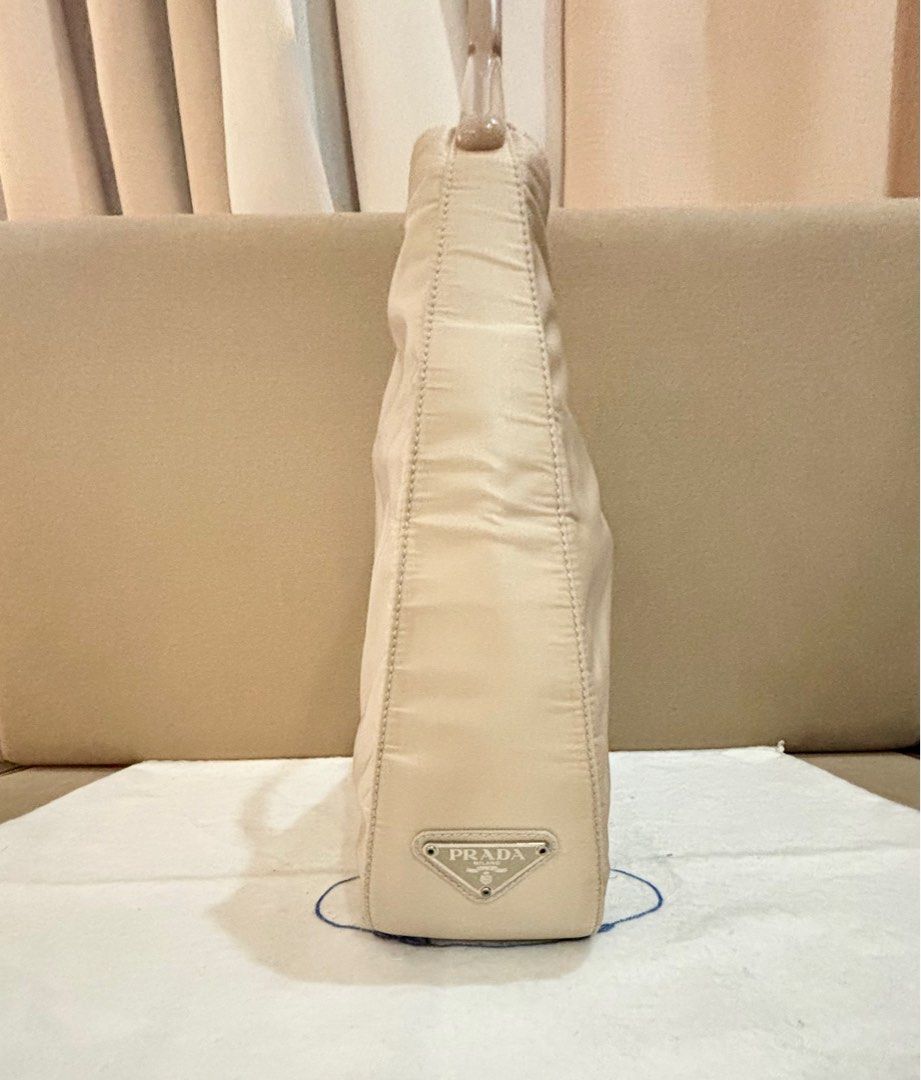 Prada Nylon Loop Shoulder Bag (Category: Luxury Bags & Wallets) located in Paranaque City. Submitted by katlouieleandicho (Listing ID 1319182646, Image 2). Description: 💯Authentic Made in Italy 10/10 condition.