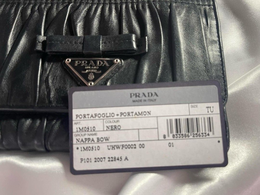 PRADA Tri-fold wallet with box and card (Category: Luxury Bags & Wallets) located in Dagupan City. Submitted by japanorigitems (Listing ID 1319228051, Image 2). Description: PRADA Tri-fold wallet/--/BLK/plain/ladies/3M1 comes with box and cards Just arrived from J.A.P.A.N GUARANTEED Original ₱10,000.
