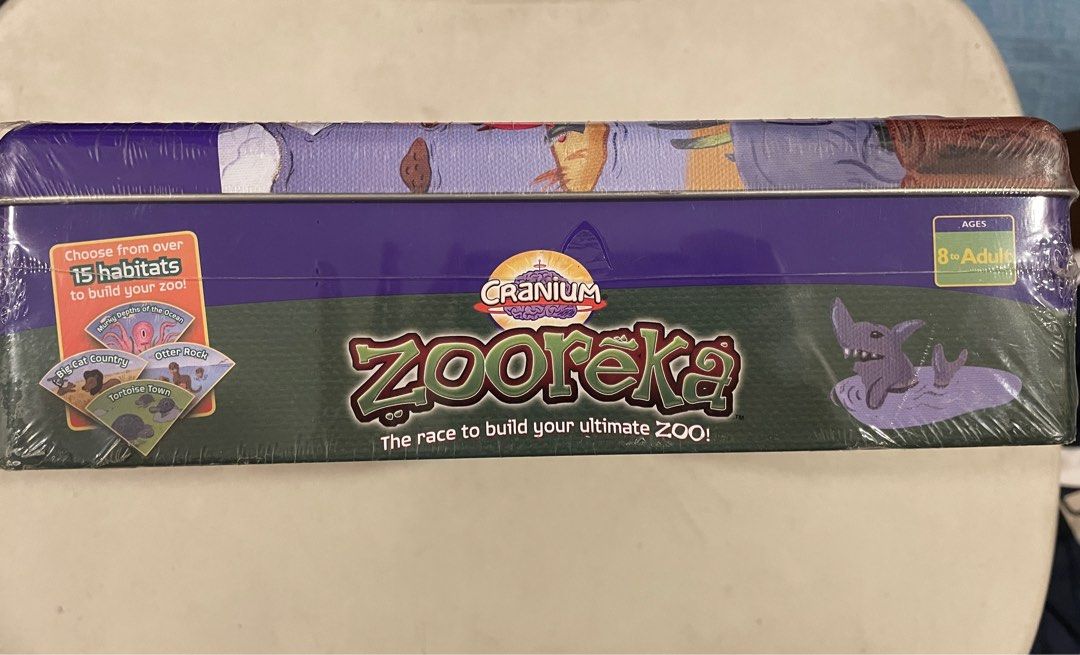 Zooreka by Cranium Board Game (Sealed/New) (Category: Board Games & Puzzles) located in Manila. Submitted by ncali (Listing ID 1319285813, Image 2). Description: Zooreka by Cranium Board Game (Sealed/New) — Brand new and never opened — Complete inclusions — Tin container payment through gcash and bank transfer shipping is shouldered by buyer through lbc, gogoxpress, j&t, same day delivery.